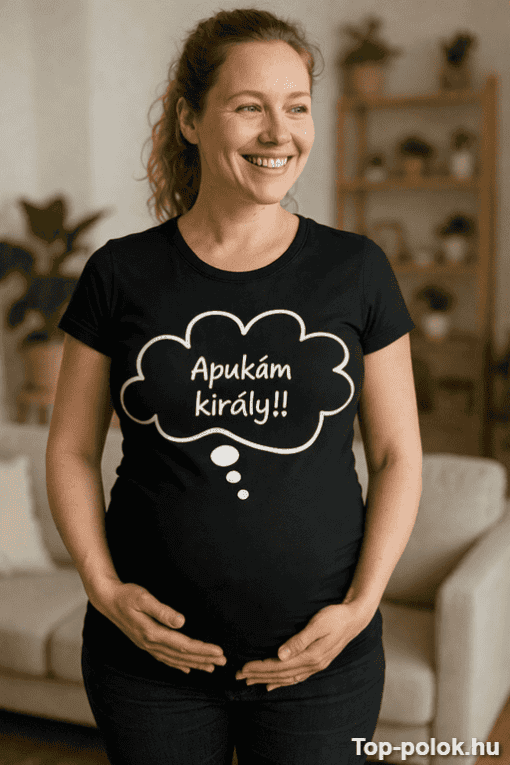 Any pregnant woman smiling and holding her belly in a cozy home setting.