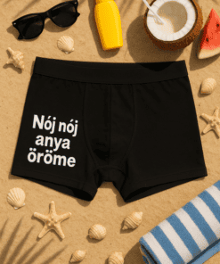 Férfi boxer rövidnadrág napozóágyon, nyári strandkiegészítők között.
