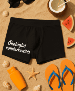Napszemüveg és fürdőruha a tengerparton, nyári nyaralás hangulatában.